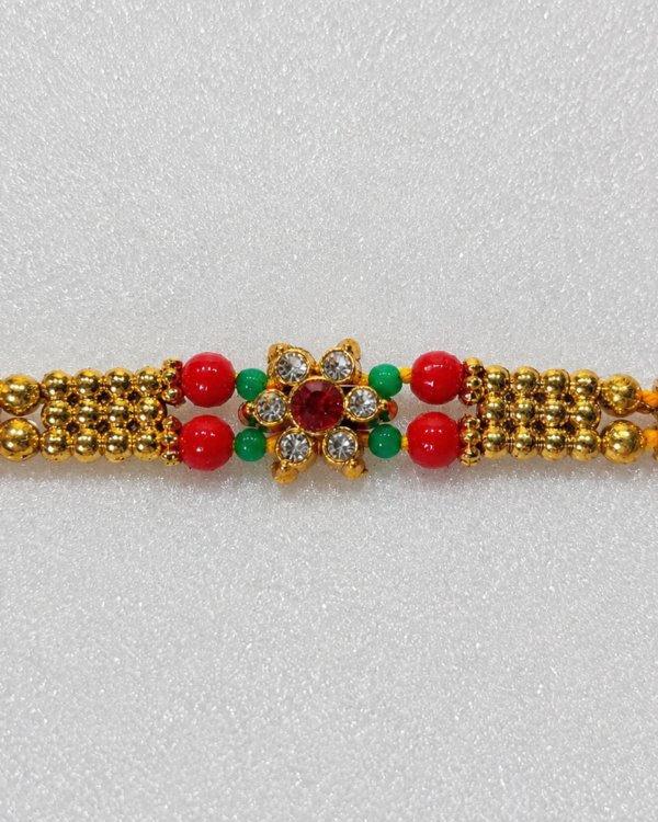Fancy Red Stone Floral Rakhi