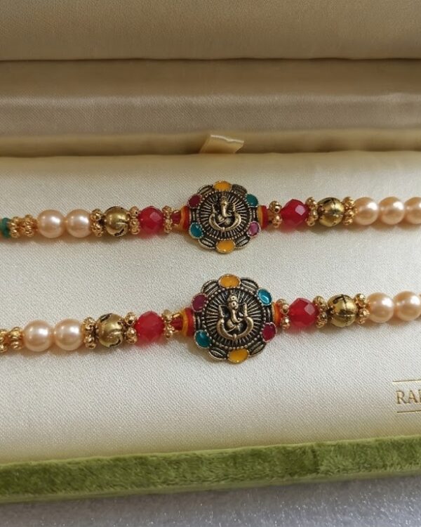 Fancy Ganpati Pearl Rakhi