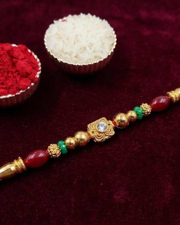 Fancy Golden Floral Stone Rakhi