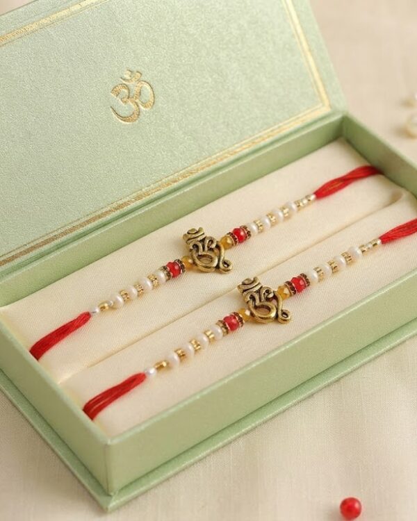 Fancy Golden Om White & Red Beads Rakhi